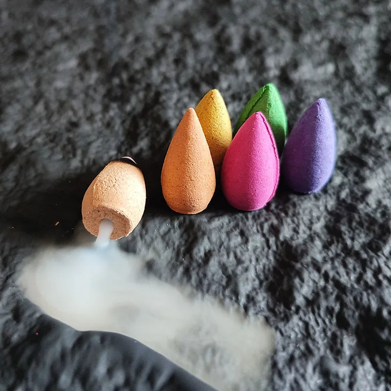 Incense cones arranged in a row