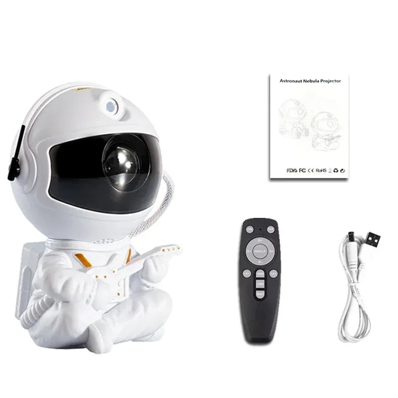 Astronaut Galaxy Projector shown with remote, USB cable and manual on white background