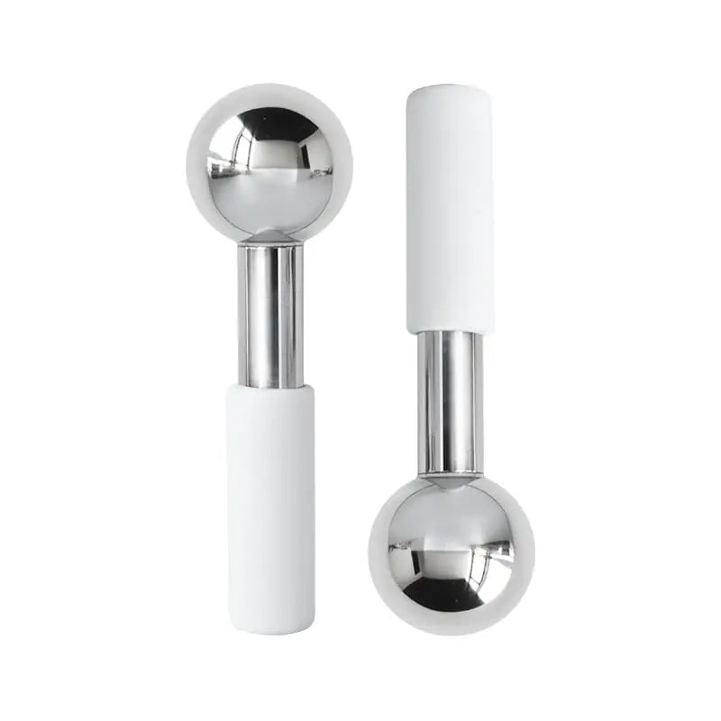 Two steel cooling globes with white handles