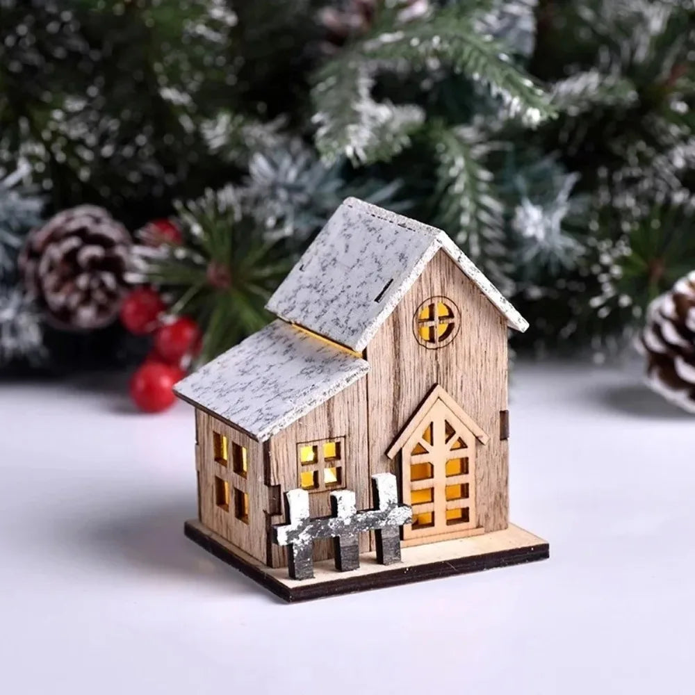 Close up of a wooden Christmas cottage light with pine cones and berries