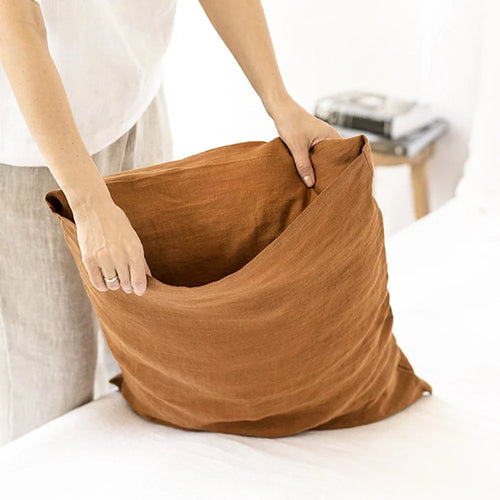 Linen pillowcase on a bed