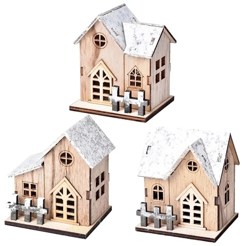 Three wooden cottage styles side by side with snowy roofs