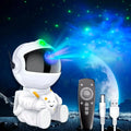 Astronaut Galaxy Projector with remote and USB cable, nebula projected on wall
