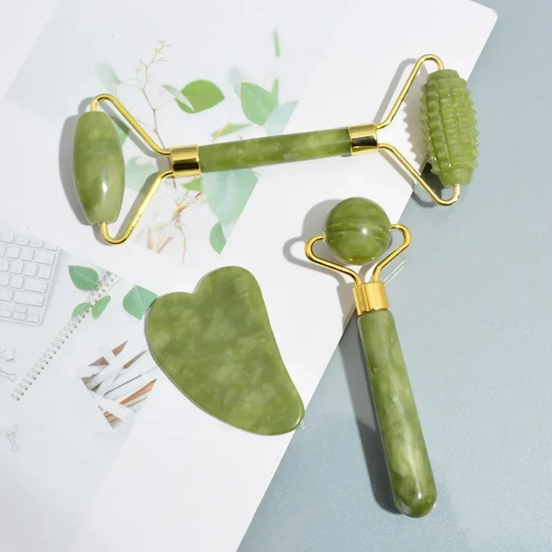 Jade roller and gua sha stone flat lay