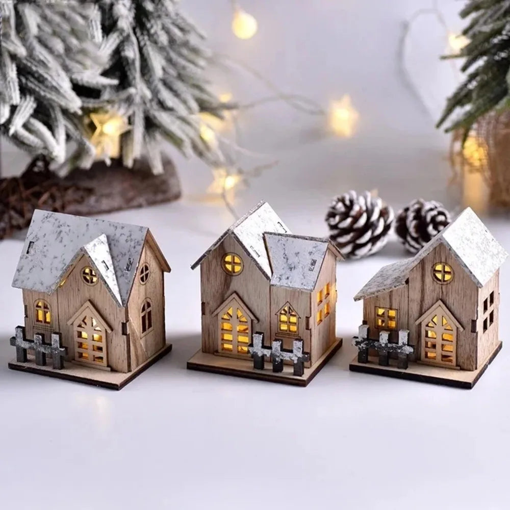 A small village of three glowing wooden cottages