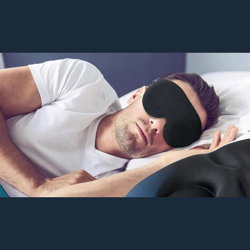 Person asleep wearing the contoured 3D sleep mask